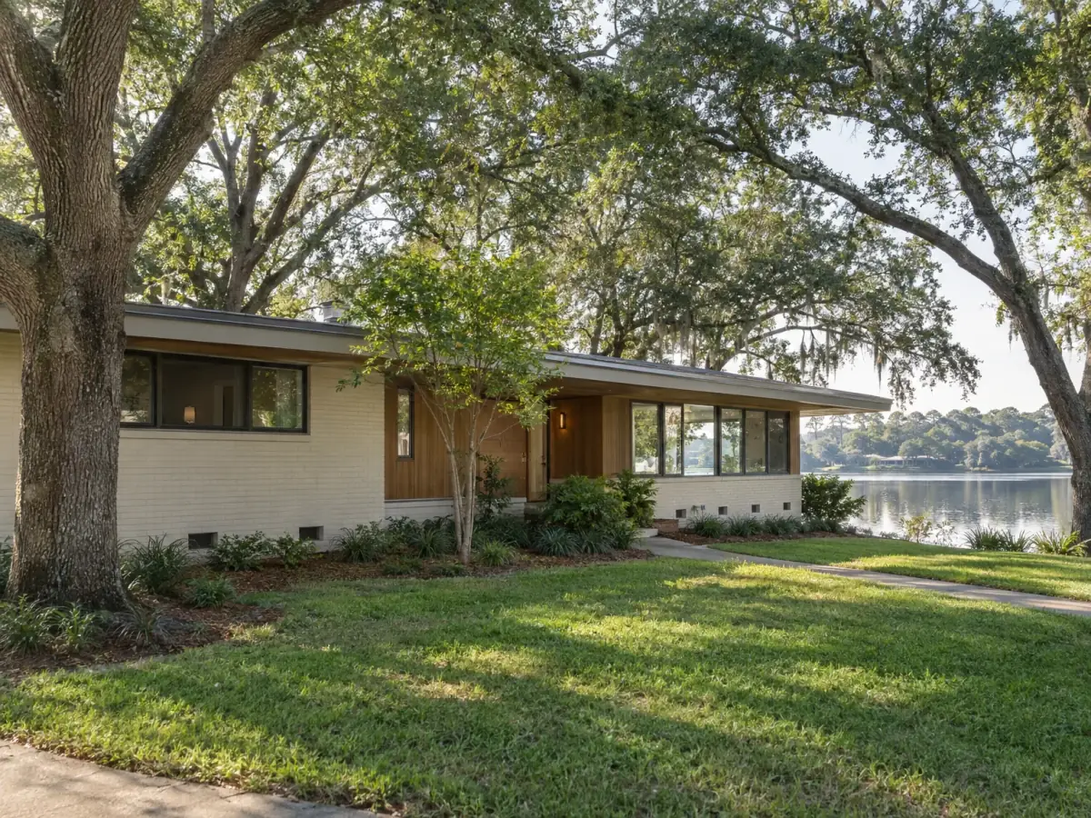 Mold remediation in Maitland, FL · illustrative image of mid-century home with crawl-space vents under mature oaks by a lake